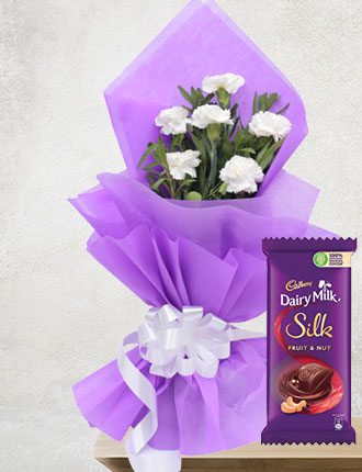 White surprise with Cadbury dairy milk Silk fruit & Nut